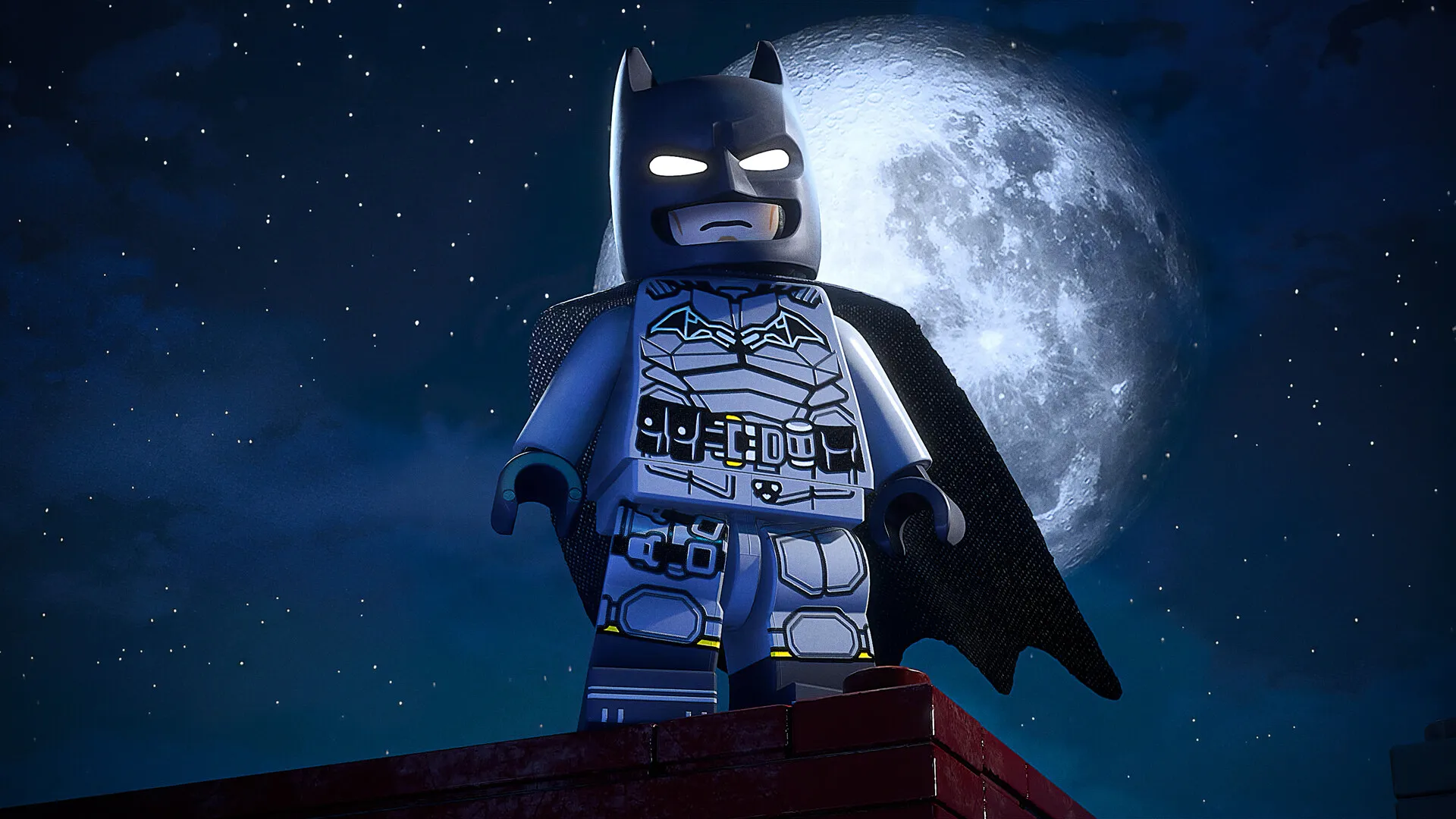 Batman on a Gotham rooftop under the moon — the starting playable hero in LEGO Batman: Legacy of the Dark Knight